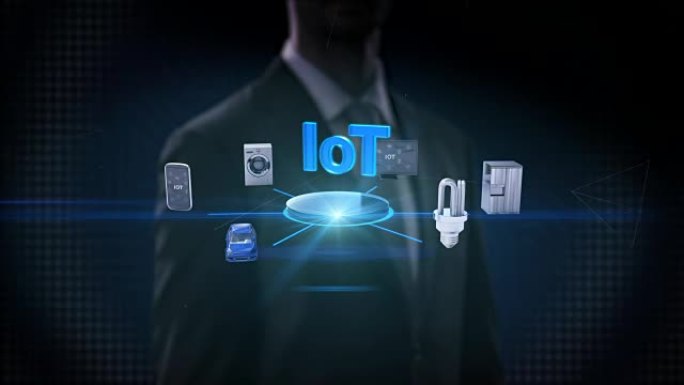 商人触摸 'IoT'，技术连接移动，汽车，节能，洗衣机，冰箱，智能家居设备，物联网。4k电影。