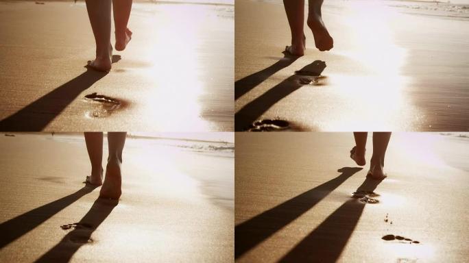 走在海滩上的女人走在海滩上的女人散步海边