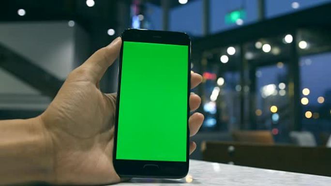 手持绿屏手机