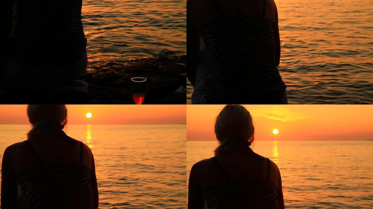HD：日落海滩上的孤独女人