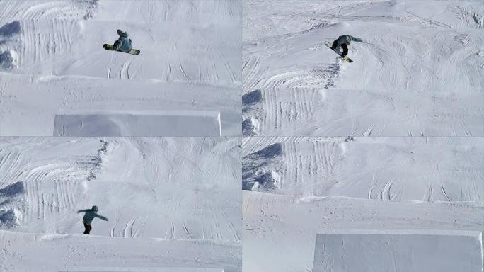 雪地公园的滑雪板跳跃