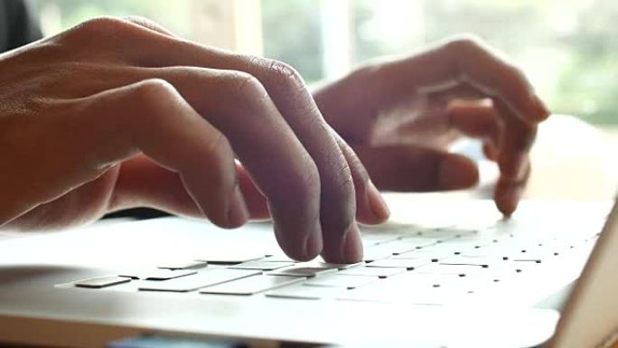 4K: 女商人正在笔记本电脑键盘上打字