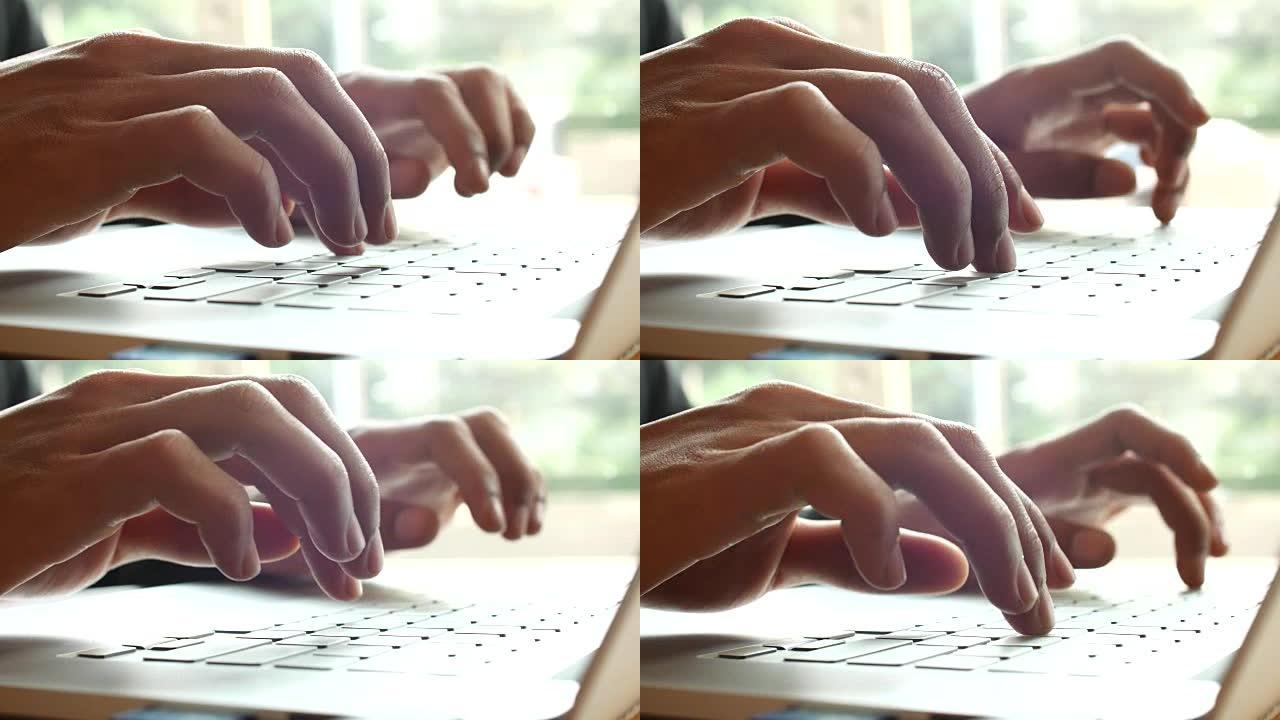 4K: 女商人正在笔记本电脑键盘上打字