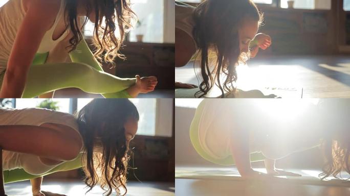 20多岁的女性在瑜伽中心的垫子上做体式