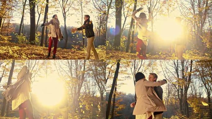 SLO MO爱心夫妇在秋天的森林中拥抱