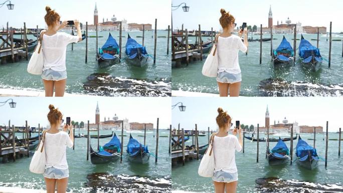 年轻女游客为意大利威尼斯拍照