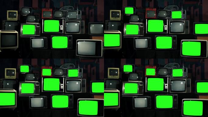 许多带有绿色屏幕的电视。铁调。80年代的美学。