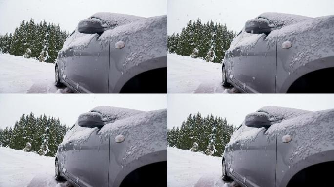 前院下着大雪，前景是一辆汽车