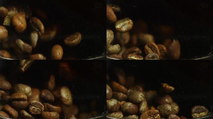 生咖啡豆在专业烘焙，在合适的温度下慢动作烧烤。