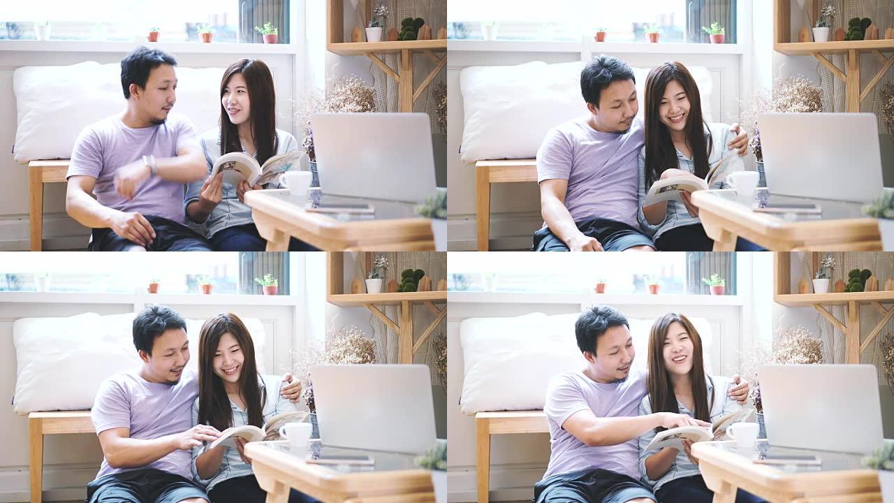 4k镜头亚洲女性穿着休闲西装阅读和与男人坐在一起的场景使用智能手机充满甜蜜的时刻在现代共同工作空间，