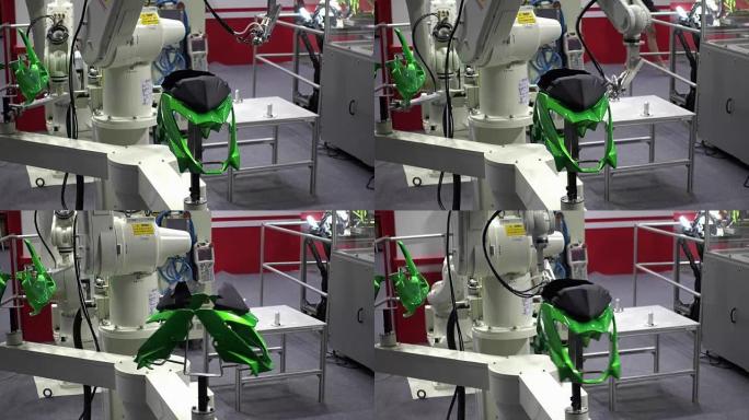 工业机器人手执行在控制单元中编程的动作，工业4.0技术概念