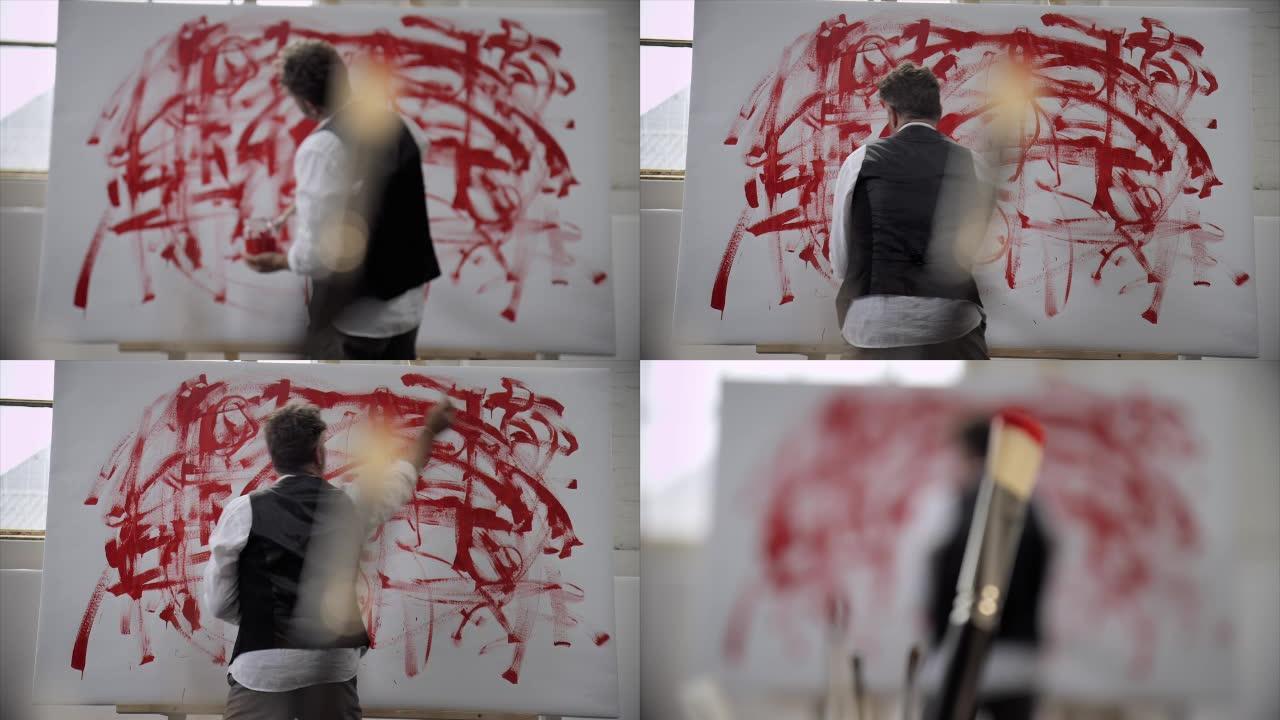 艺术家在画布上用红色作画