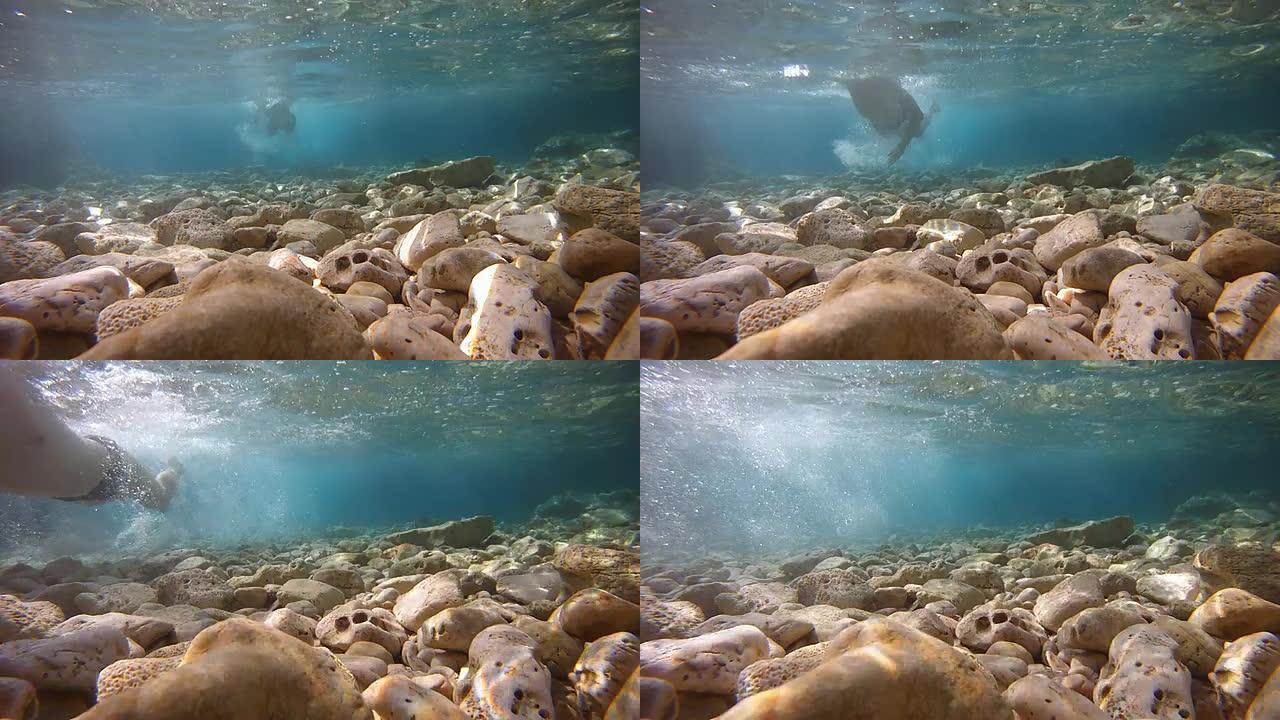 高清慢速运动：游泳运动员的水下镜头
