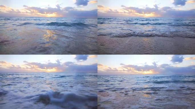 日落时分，海浪涌向沙滩
