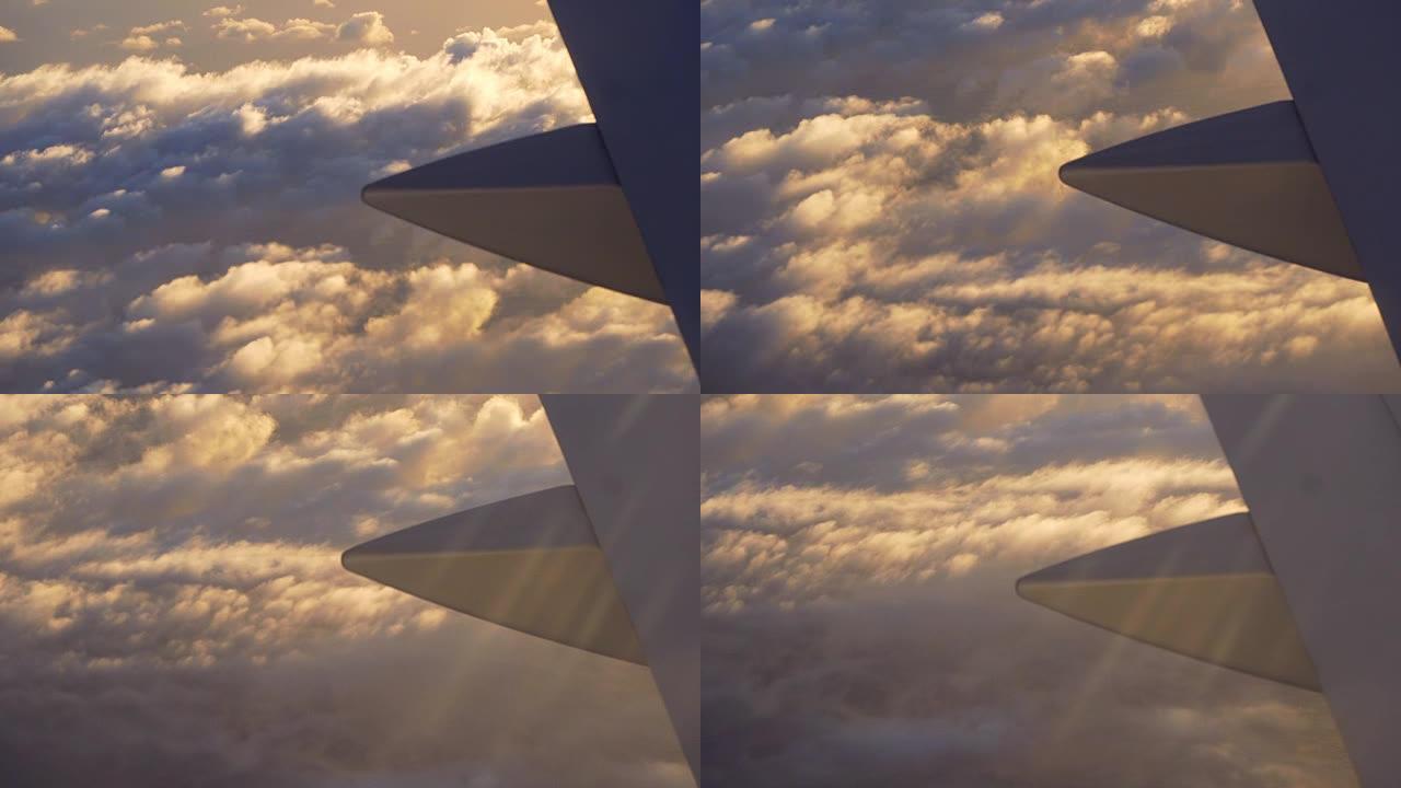 飞机在转弯时从飞机窗口看到云彩