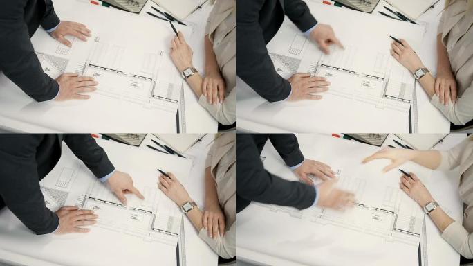 建筑师握手创意团队图纸研发