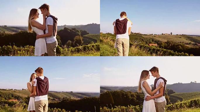 草地上的浪漫情侣热恋期间短裙连衣裙逆光光