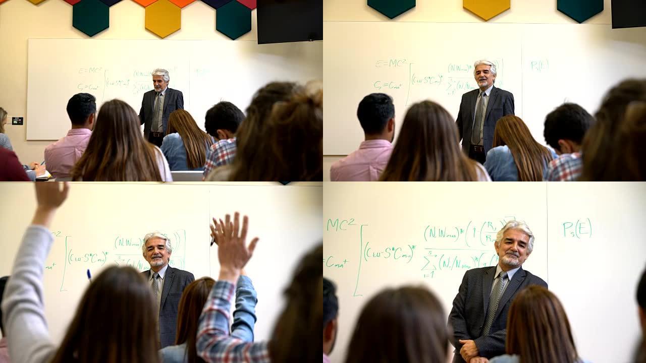 男老师在课堂上提问，学生举手