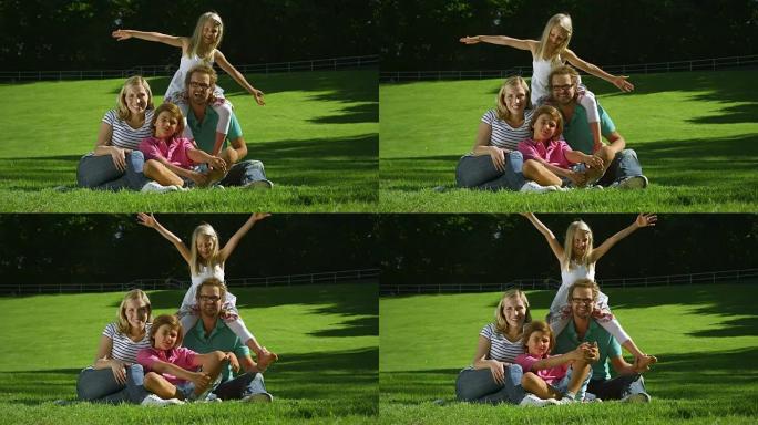 一家人坐在公园里