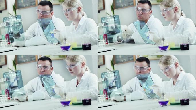 在实验室工作的化学家。