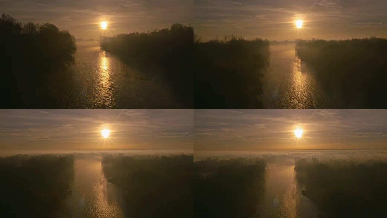 日出时空中薄雾在穆尔河上爬行
