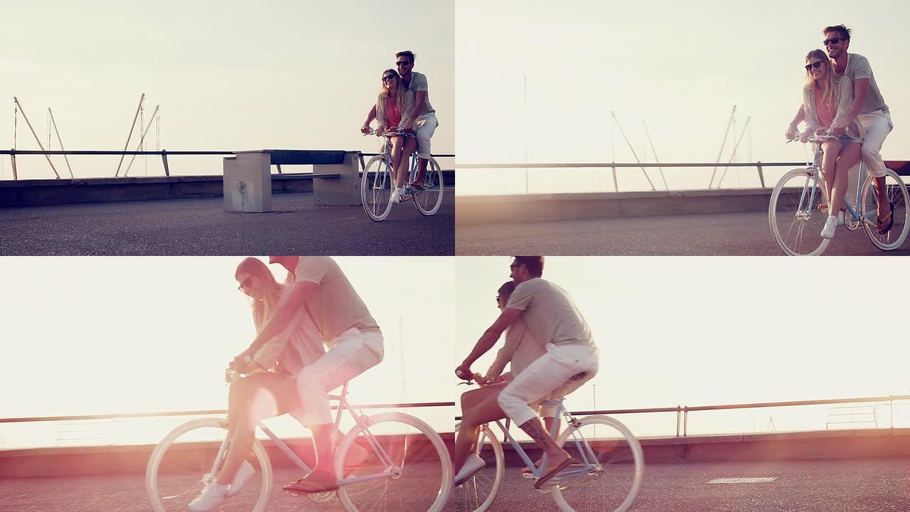 海滩上的夫妇外国情侣骑单车单车旅行