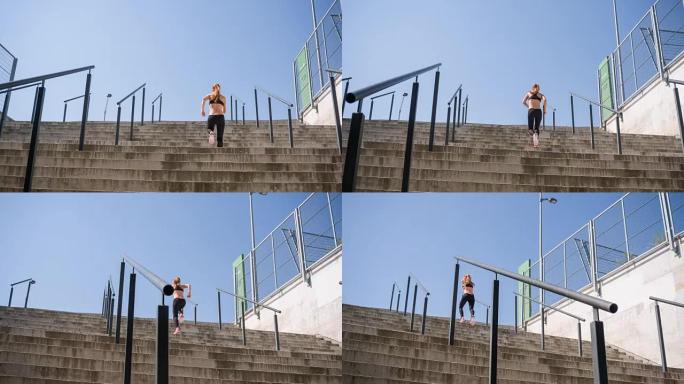 年轻女运动员跑上楼梯