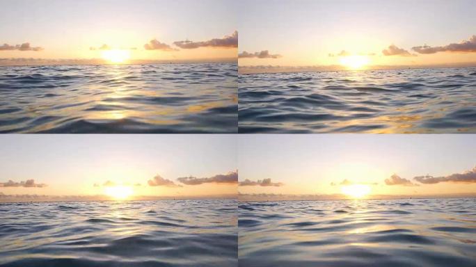 海洋上的日落景色海平面夕阳流动海水