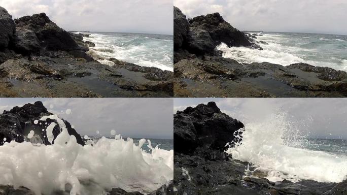 海浪在岩石上破碎海浪礁石海水拍打