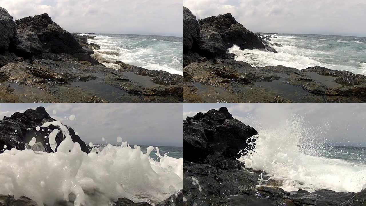 海浪在岩石上破碎海浪礁石海水拍打