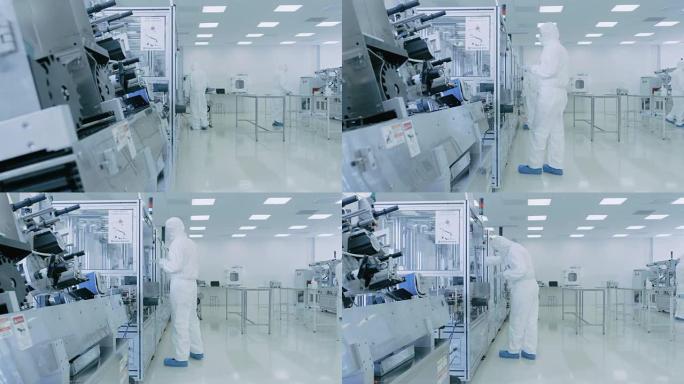在实验室中，科学家穿着无菌防护服套装的现代工业3D打印机，在加工过程中高精度制造半导体。