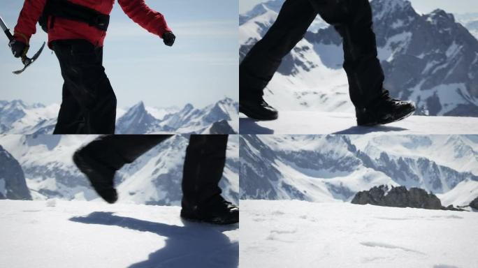 登山者在山上的雪地上行走