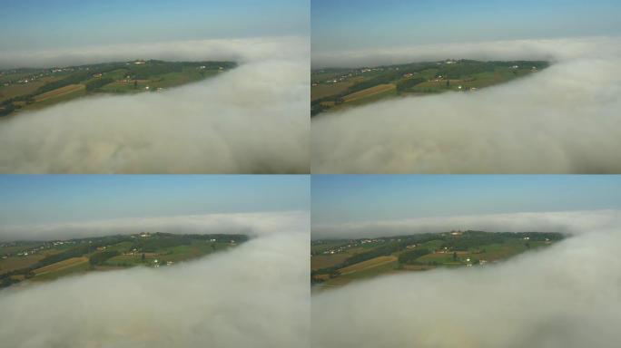 雾中的空中丘陵乡村