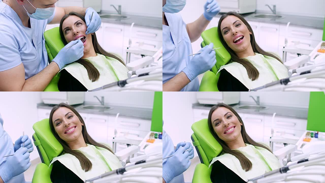 牙医的年轻女子口腔问题治疗处理蛀牙龃齿