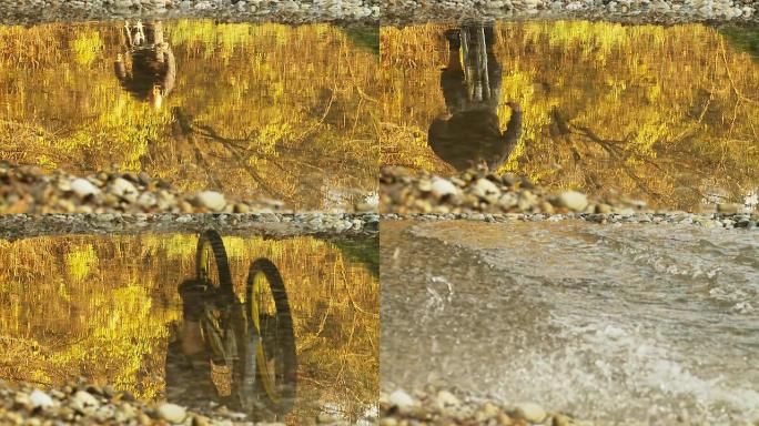 高清慢速运动：自行车在水坑中飞溅