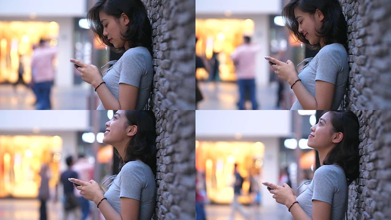 在街上使用智能手机的女人，4k