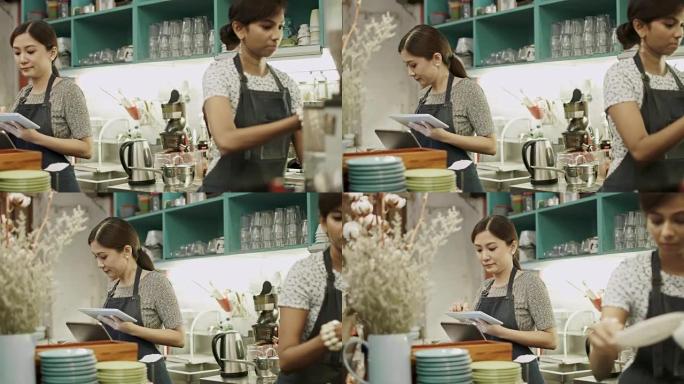 在马来西亚咖啡店工作的亚洲女性实时平移视频