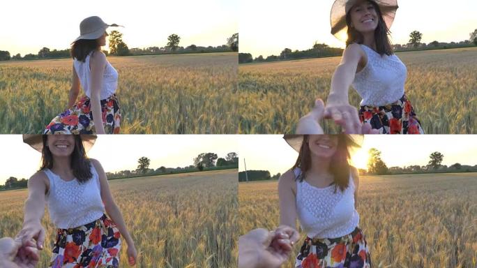 草地上的农民快乐女孩向周围的大自然展示了幸福。
