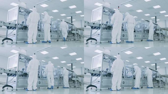 在科学家穿着无菌防护服的制造工厂团队中，设置了现代工业3D打印机，正在加工半导体的高精度制造。
