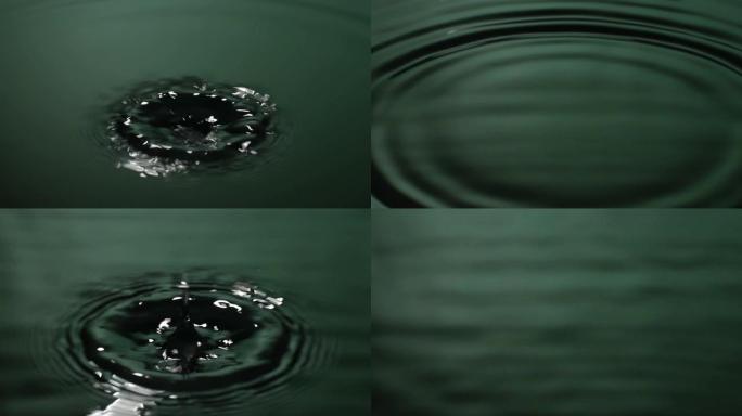 慢动作: 许多水滴变成绿色的水。