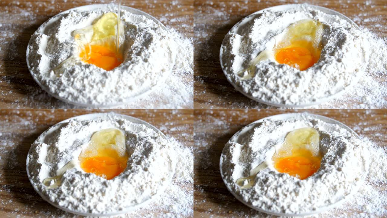 鸡蛋落入面粉中鸡蛋落入面粉