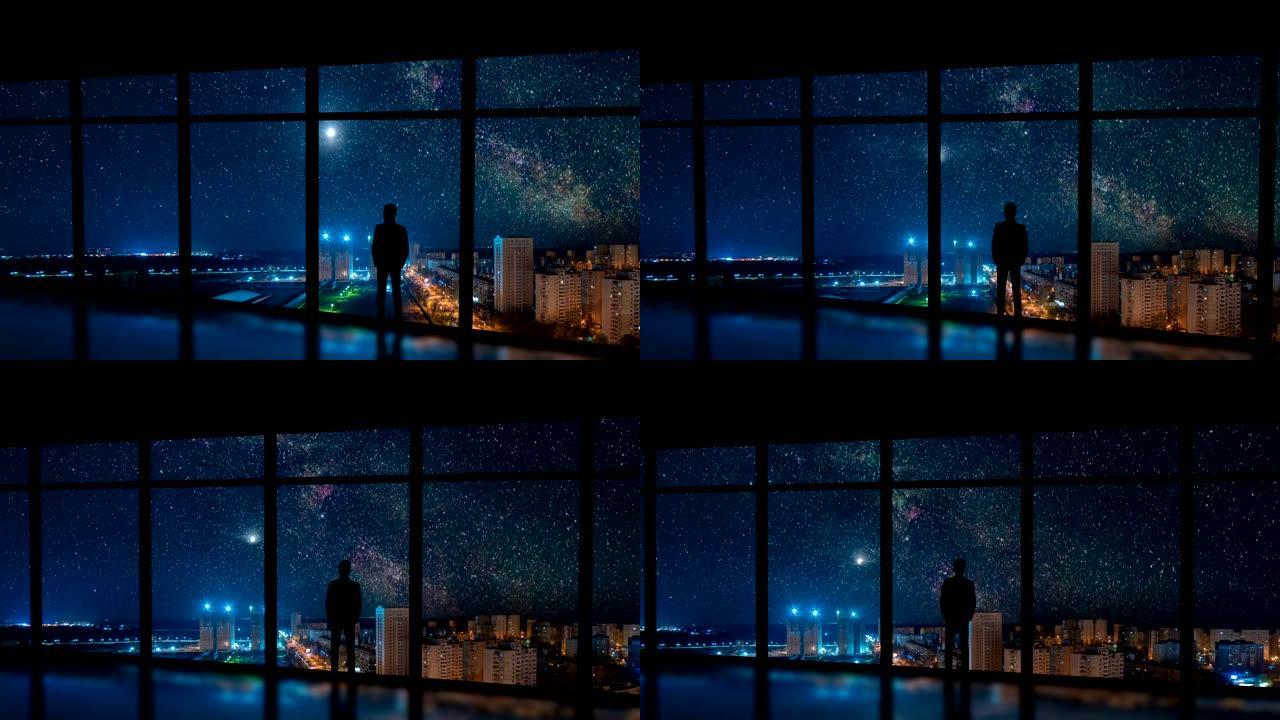 那个站在城市窗户附近的男人，有着星星的背景。时间流逝