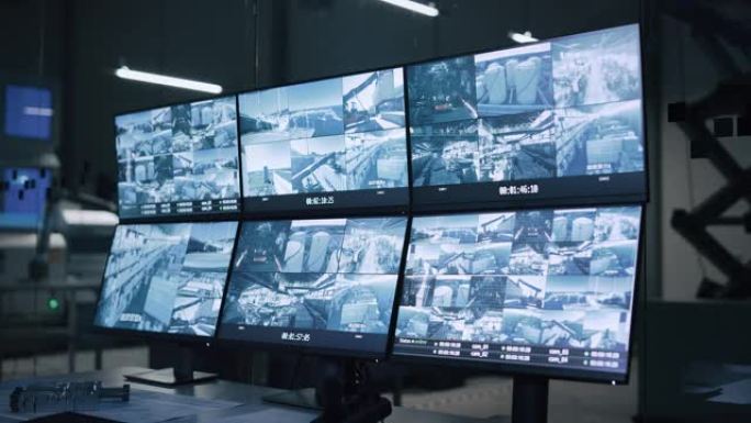 工业4.0现代工厂: 安全控制室与多戳计算机屏幕显示监控摄像机录像源。高科技安全