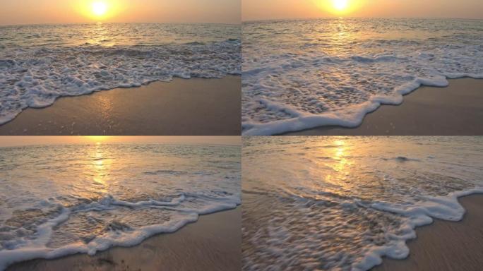 WS海浪在日落时溅沙