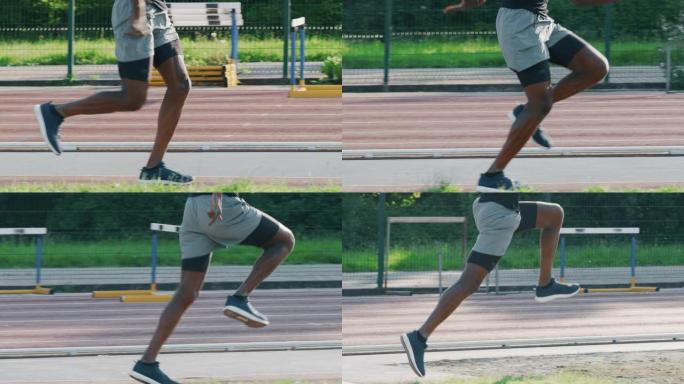 年轻的非洲男运动员的慢动作在阳光明媚的日子里在体育馆的赛道上跳远