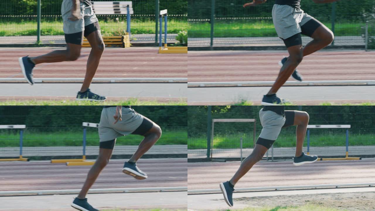年轻的非洲男运动员的慢动作在阳光明媚的日子里在体育馆的赛道上跳远