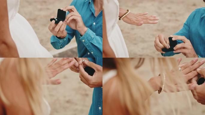 男友在女友的手指上戴戒指