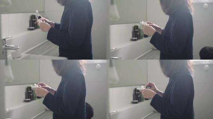 女人的手在牙刷上挤牙膏