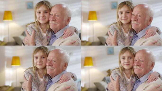慈爱的祖父和孙女的肖像