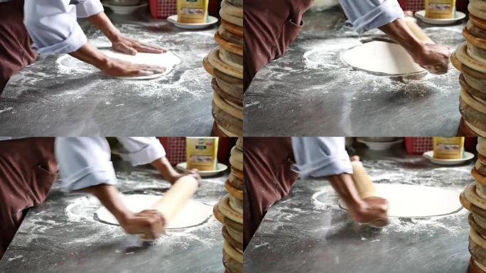 厨师制作披萨面团擀面杖面食大饼